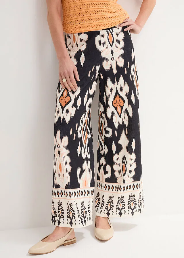 PANTALóN DE PUNTO NEGROCRUDOMARRóN ANARANJADOCAFé CON LECHE